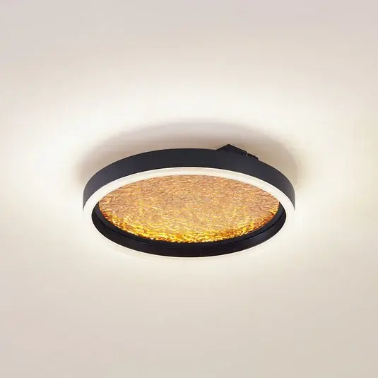 Lucande Plafoniera LED Menulis, nero/oro, PC, Ø 30 cm Novità